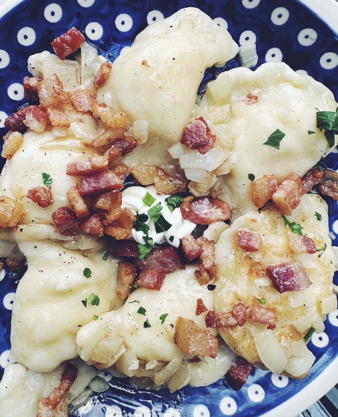 Potato and cheese pierogi with bacon and sour cream at Pierogi Kitchen Chicago