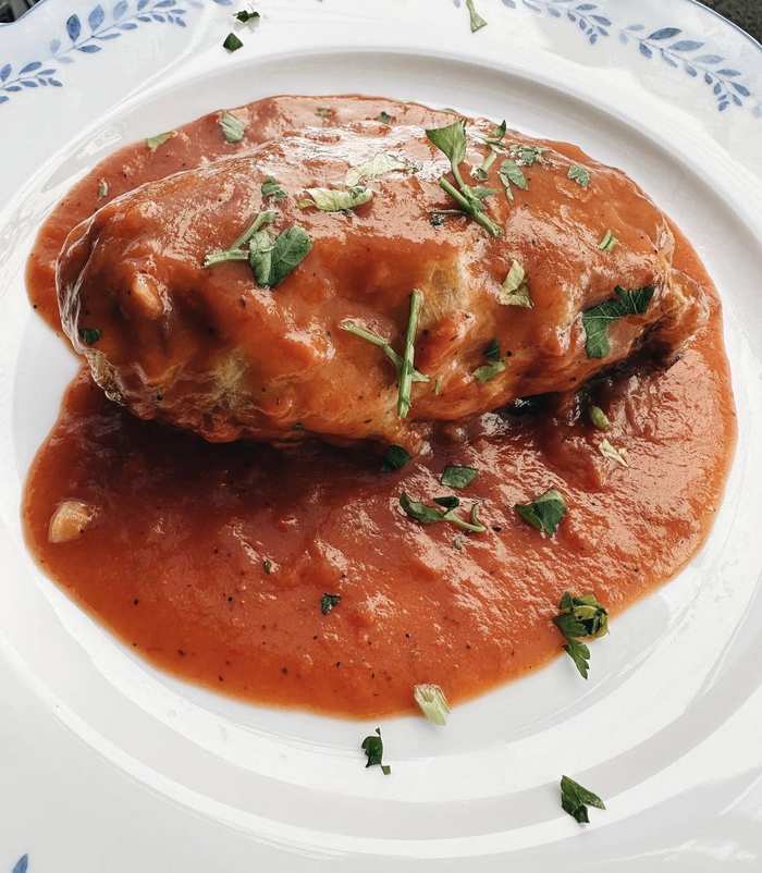 Gołąbki — stuffed cabbage roll in tomato sauce